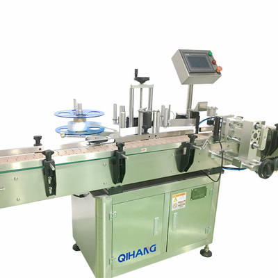 Automatic Economical, Self Contained Labeling System With A Variable Speed Conveyor.