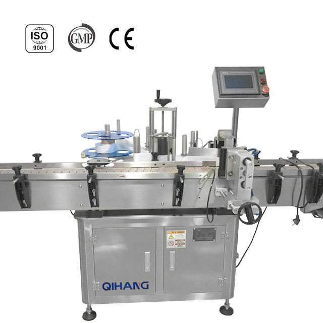 Automatic Economical, Self Contained Labeling System With A Variable Speed Conveyor.